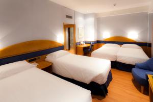 habitación cuádruple estándar - Hotel Agumar