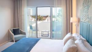 habitación doble premium con vistas al mar - Alanda Marbella Hotel