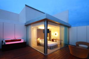 suite con terraza - Alenti Sitges Hotel & Restaurant