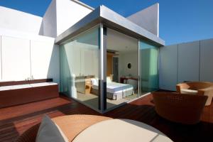 suite con terraza - Alenti Sitges Hotel & Restaurant
