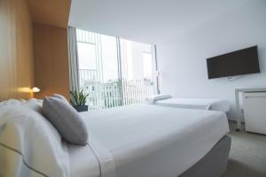 habitación triple - Alenti Sitges Hotel & Restaurant