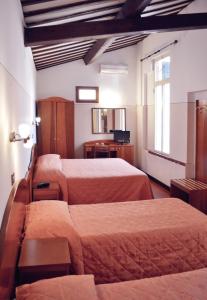 habitación cuádruple económica - Hotel Arno Bellariva