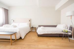 habitación triple deluxe (2 adultos + 1 niño) - Hotel ARTIEM Madrid