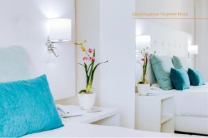 habitación doble superior (2 adultos + 1 niño) - 2 camas - Hotel Auramar Beach Resort
