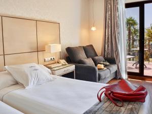 habitación doble superior con vistas al lago (2 adultos) - B bou Hotel La Viñuela & Spa