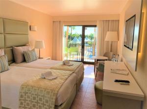 habitación deluxe con vistas a la piscina - 2 camas - Hotel Baia Grande