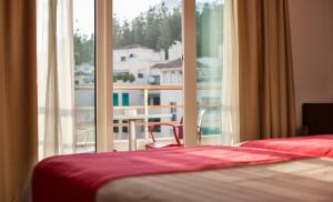habitación doble con cama supletoria (3 adultos) - Hotel Baviera