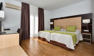 habitación doble con cama supletoria (3 adultos) - Hotel Baviera