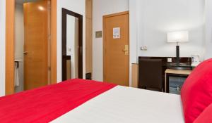 habitación doble con cama supletoria (2 adultos + 1 niño) - Hotel Baviera