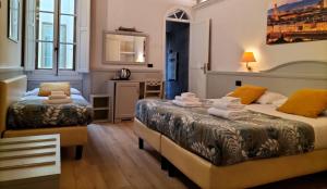 habitación triple clásica - Hotel Camilla Firenze