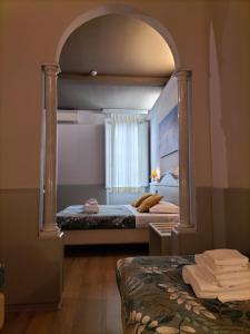 habitación cuádruple clásica - Hotel Camilla Firenze