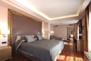 habitación deluxe con cama extragrande - Hotel Casa Consistorial