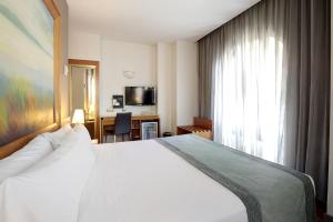 habitación triple - Hotel Catalonia Excelsior