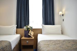 habitación doble deluxe - 2 camas - Central Park Hotel