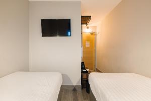 habitación con 2 camas individuales - planta baja sin ventanas - Hotel CitySpace Tower Bridge