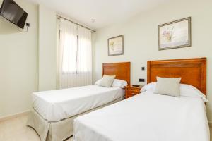 habitación familiar con vistas al jardín - Hotel Daniya Denia Spa & Business 4*