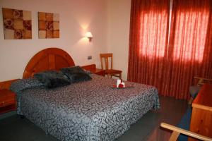 habitación doble - 1 cama extragrande - Hotel El Pinche de Oro