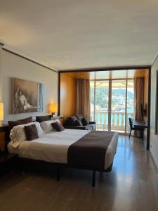 habitación doble deluxe con balcón y vistas al mar - 1 o 2 camas  - Hotel Estela Barcelona