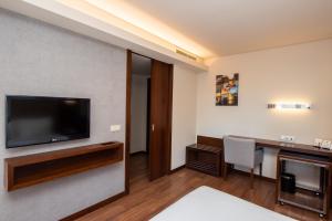 apartamento con balcón para uso individual - Hotel Eurostars Oporto
