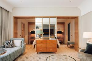 suite junior del four seasons con cama extragrande - Four Seasons Hotel Ritz Lisbon