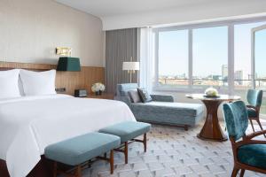 Habitación Premier con cama extragrande y vistas al parque - Four Seasons Hotel Ritz Lisbon