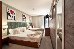habitación triple - Galeria Suite Hotel