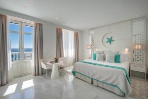 habitación triple deluxe con vistas al mar - Gran Hotel Miramar GL