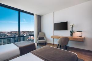 habitación doble superior con vistas a la ciudad - Hotel Iberostar Selection Lisboa