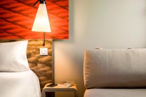 habitación doble con cama supletoria  - Hotel ibis Faro Algarve