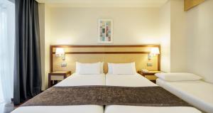 habitación doble con cama supletoria - 1 o 2 camas (2 adultos + 1 niño) - Hotel Ilunion Pio XII