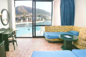 habitación triple (2 adultos + 1 niño) - Hotel Kaktus Albir