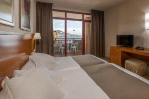 habitación doble con vistas al mar - 2 camas - Hotel Las Palmeras Affiliated by FERGUS