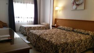 habitación doble con cama supletoria (2 adultos + 1 niño) - 2 camas - Hotel Las Rampas
