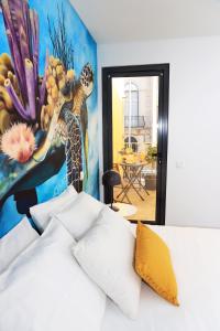 habitación doble deluxe con balcón - Hotel Le Jardin Secret de Faro Guesthouse