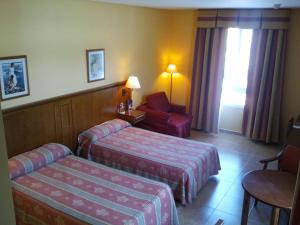 habitación individual amplia - Hotel Lozano