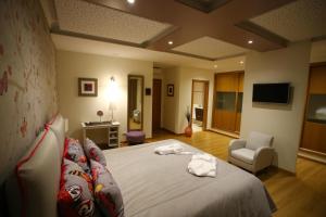 habitación doble - 1 o 2 camas - Hotel Luxury Guest House_Opus One