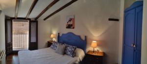 apartamento de 2 dormitorios - Hotel Masía de San Juan, casa rural renovada en Castillo con piscina y Aire Acondicionado