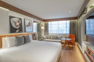 habitación premium con cama extragrande - Melia White House Hotel