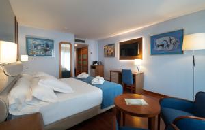 habitación doble con cama supletoria - 2 camas - Hotel MS Maestranza Málaga