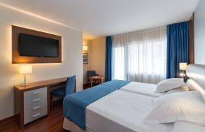 habitación doble con cama supletoria - 2 camas - Hotel MS Maestranza Málaga
