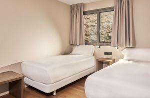 habitación cuádruple familiar - Hotel NH Andorra la Vella