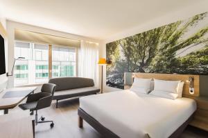habitación deluxe con cama doble - Hotel Novotel Campo De Las Naciones