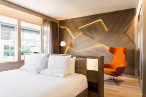 suite junior con zona de salón - Hotel Novotel Campo De Las Naciones