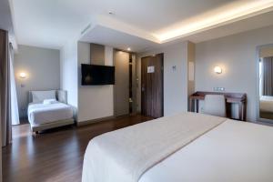 habitación triple - Oca Oriental Porto Hotel