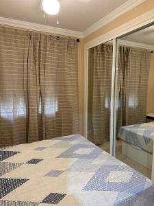apartamento de 3 dormitorios - Hotel OLIVA NOVA GOLF BEACH & RESORT club sevilla IV 33A
