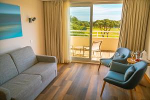 suite con balcón - Onyria Quinta da Marinha Hotel