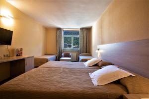 habitación cuádruple con acceso al spa (2 adultos + 2 niños) - Hotel Panorama