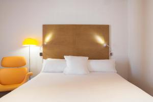 habitación cuádruple (4 adultos) - Hotel Petit Palace Plaza Málaga