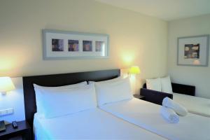 habitación doble (2 adultos + 1 niño) - 1 o 2 camas - Hotel Port Feria Valencia