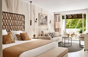 suite junior deluxe con vistas jardín - Hotel Puente Romano Beach Resort